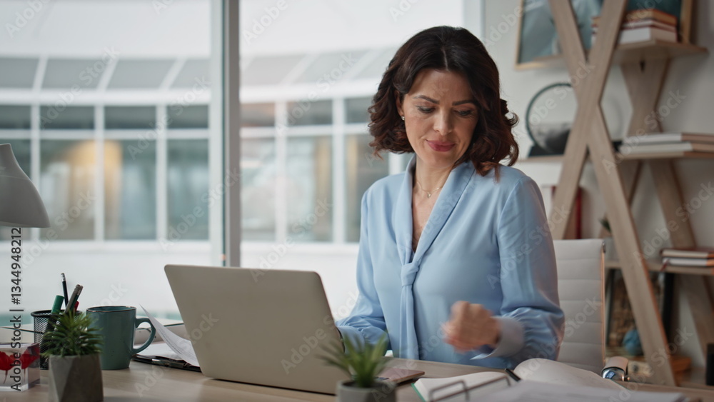 Financial manager working company office with laptop and documents efficiently Financial manager working company office with laptop and documents efficiently