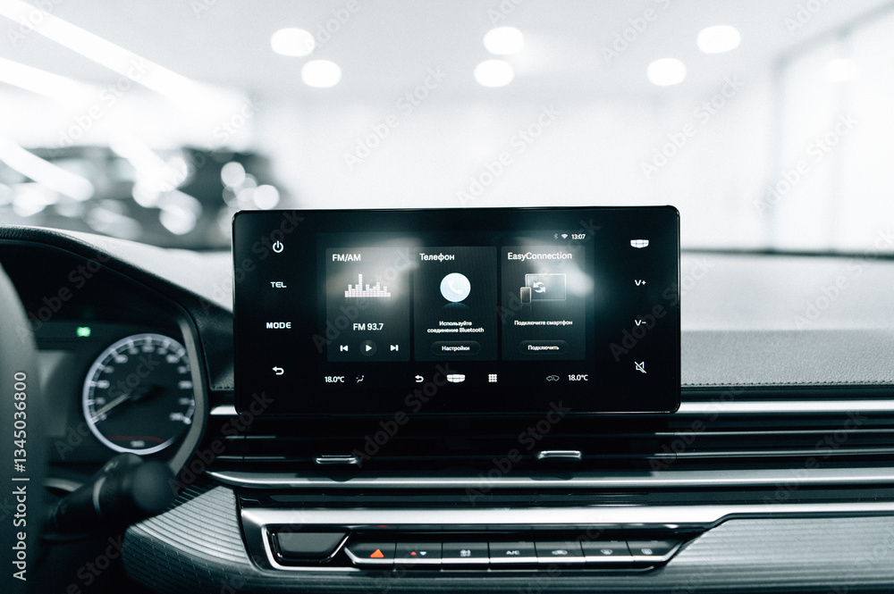 Naklejka premium Multimedia screen in an expensive new car