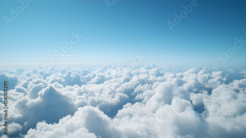 Bright Blue Sky With Layered White Fluffy Clouds Creating Scenic Atmospheric Aerial View
