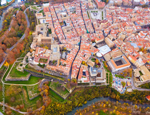 Panoramic view of tiled housetops and bastion of medieval town Pamplona in Navarre, Spain photo