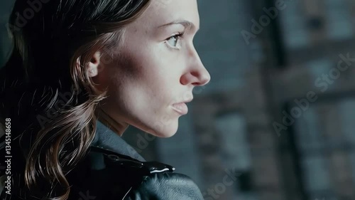 Portrait of a confident young woman in an urban setting, showcasing a strong expression with stylish and edgy lighting, perfect for city life or fashion concepts.