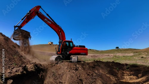  Excavator with big shovel in the excavation of the construction site. One machine works at a quarry, moving dirt. Heavy machinery at industrial construction site. Excavator digging soil pits 