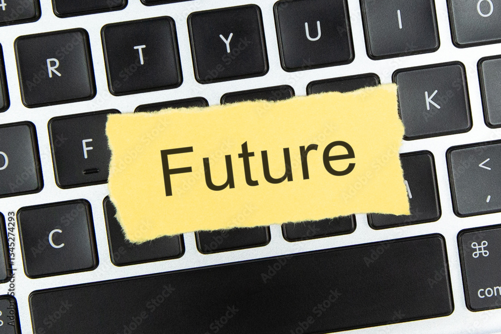 “Future” text on torn paper on top of laptop keyboard