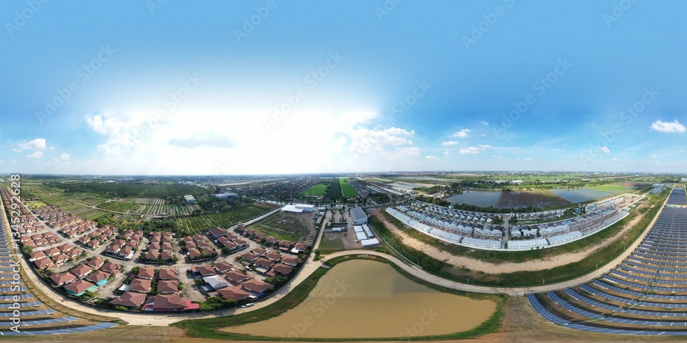 Fototapeta premium Solar Farm (solar cell) on sunny day background with electric power generation in agricultural area . Renewable green alternative energy. Power plant.Solar photovoltaic rows array ground mount system