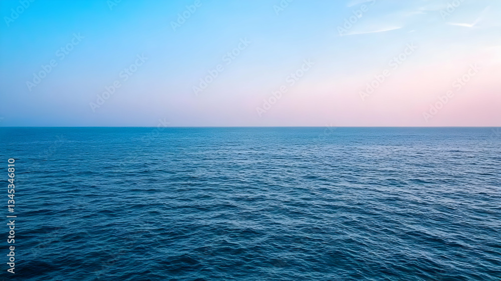 Blue Ocean Surface Under A Pastel Sunset Sky Horizon With Light Reflections Blue Ocean Surface Under A Pastel Sunset Sky Horizon With Light Reflections