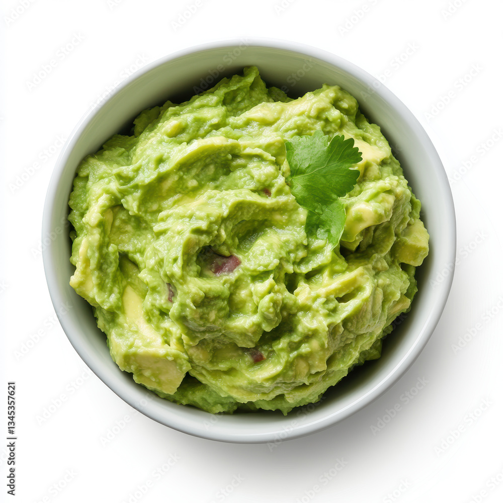 Fresh guacamole with cilantro in white bowl Fresh guacamole with cilantro in white bowl