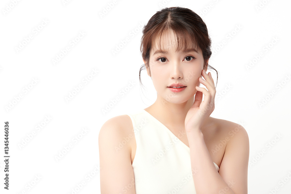 A beautiful young Asian woman with clean, fresh skin against a white background. Skincare, facial treatment, cosmetology, beauty, and spa. An elegant portrait of an Asian woman. A beautiful young Asian woman with clean, fresh skin against a white background. Skincare, facial treatment, cosmetology, beauty, and spa. An elegant portrait of an Asian woman.