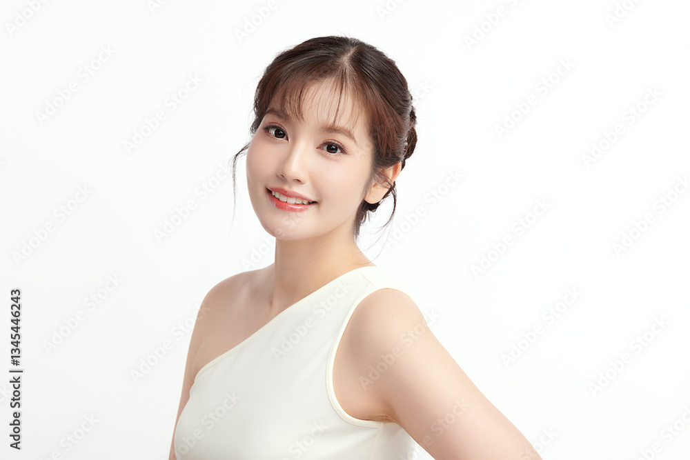A beautiful young Asian woman with clean, fresh skin against a white background. Skincare, facial treatment, cosmetology, beauty, and spa. An elegant portrait of an Asian woman. A beautiful young Asian woman with clean, fresh skin against a white background. Skincare, facial treatment, cosmetology, beauty, and spa. An elegant portrait of an Asian woman.