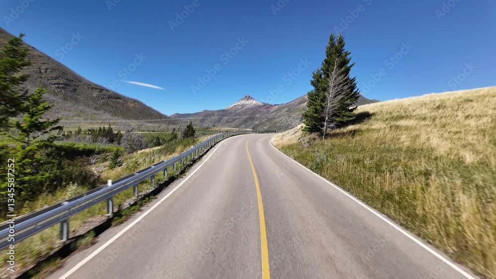 POV Driving on a Winding Mountain Road Through a Scenic Landscape on a Sunny Day POV Driving on a Winding Mountain Road Through a Scenic Landscape on a Sunny Day