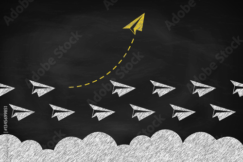 Yellow paper plane changing direction around the clouds in the sky. Think differently concept