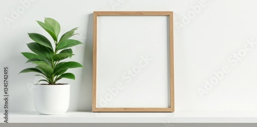 Elegant picture frame, green plant on white shelf, shelf, clean