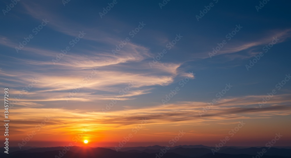 Soft Wispy Cirrus Clouds at Sunrise Over a Deep Blue Sky Soft Wispy Cirrus Clouds at Sunrise Over a Deep Blue Sky