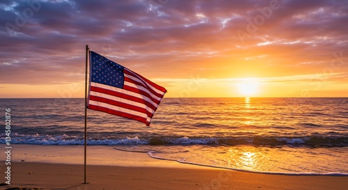 Fototapeta Naklejka Na Ścianę i Meble -  American flag waving on beach at golden sunset. Patriotic symbol of freedom, national unity and Memorial Day remembrance for web banner or advertisement with inspiring concept