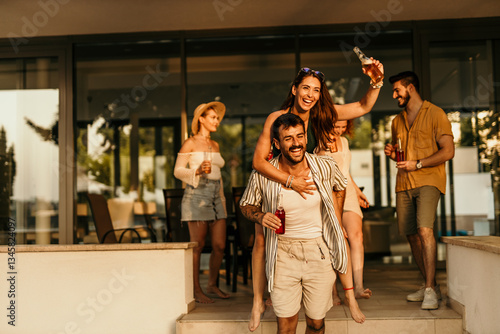 Wallpaper Mural Friends enjoying drinks at a rooftop party, celebrating and having fun Torontodigital.ca