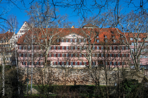 Historic Burse Building in the old town of Tübingen on a sunny day in winter seen from across the Neckar River