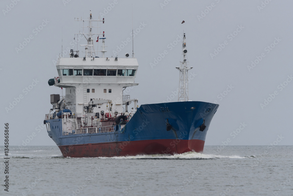 Fototapeta premium MARITIME TRANSPORT - Oil products tanker sails on the sea