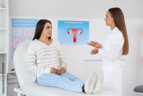 Young woman visiting gynecologist in clinic