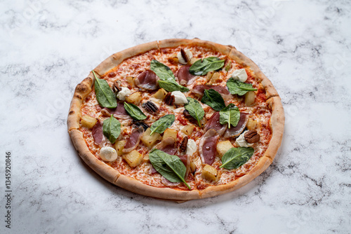 Tableau sur toile A beautifully crafted pizza emerges from a cozy European restaurant, garnished with savory meats, fresh spinach, and aromatic spices
