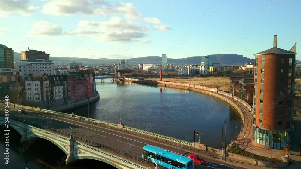 Tight reversing aerial of Queen's Bridge and the River Lagan in Belfast, Northern Ireland on a sunny day. Filmed in 4K, 60FPS with Rec709 color. Tight reversing aerial of Queen's Bridge and the River Lagan in Belfast, Northern Ireland on a sunny day. Filmed in 4K, 60FPS with Rec709 color.