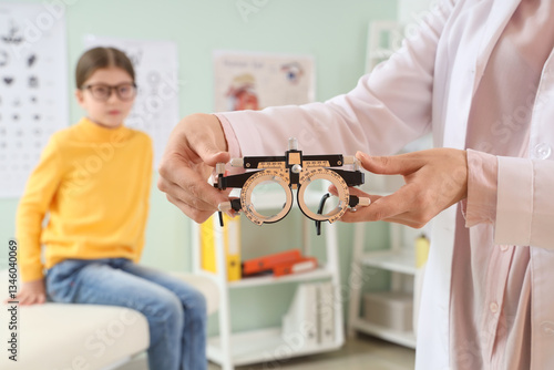 Female ophthalmologist with...