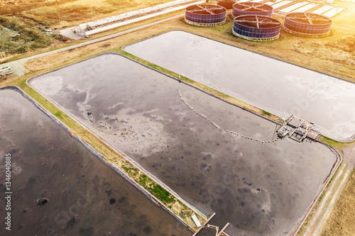 Obraz na plátne Aerial view wastewater treatment plant with sedimentation ponds and circular clarifiers