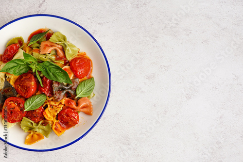 Bowl of delicious farfalle ...