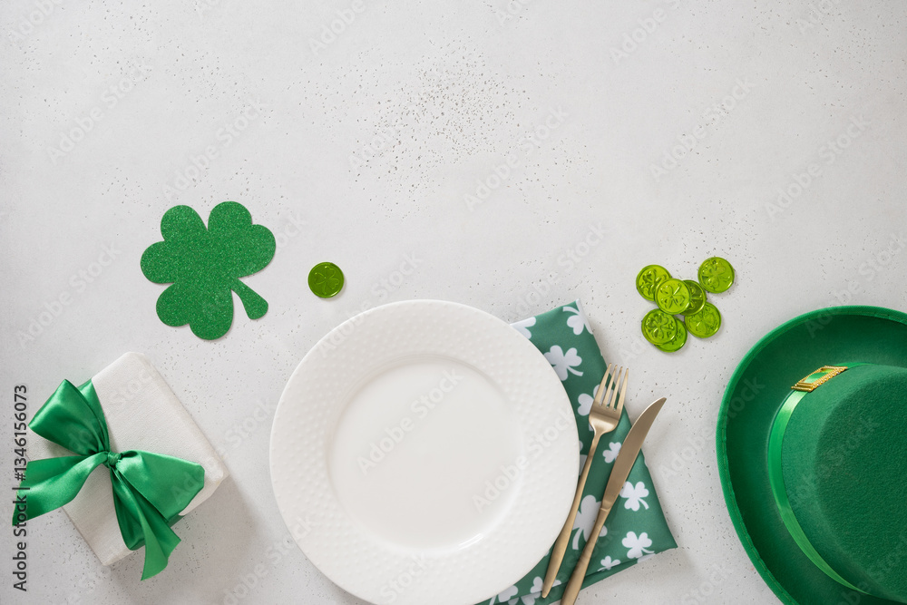 St Patrick's Day banner with white plate, cutlery, table setting, gift, leprechaun hat and clover leaves on white background. View from above. Copy space.