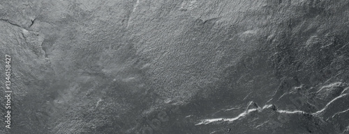 Gray slate stone background with a rough texture. The background features a natural, rugged gray appearance with subtle cracks. Textured stone background vector. Gray background.