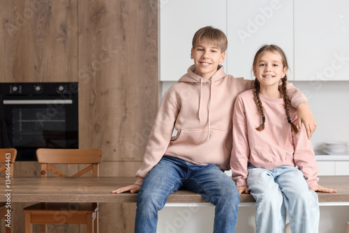 Teenage boy with his sister...