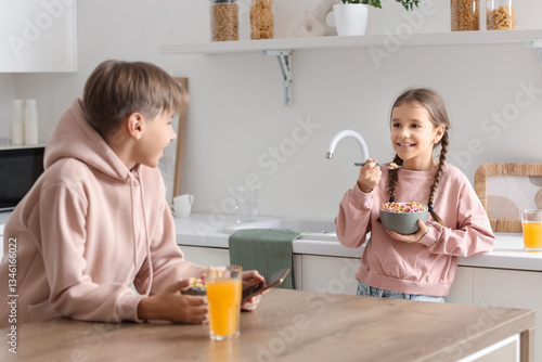 Cute girl with her brother ...