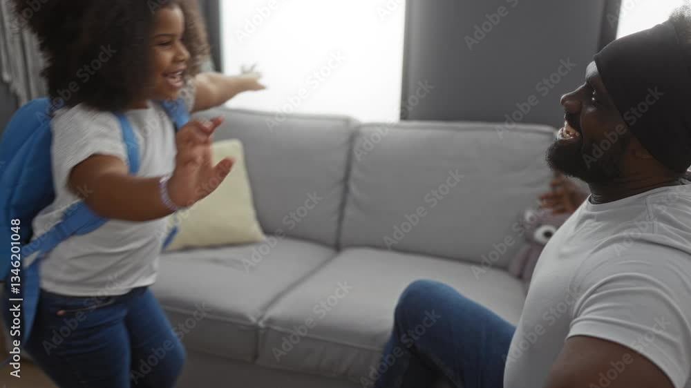Father and daughter embrace warmly in a cozy living room, showcasing a tender moment of love and family connection during daytime. Father and daughter embrace warmly in a cozy living room, showcasing a tender moment of love and family connection during daytime.