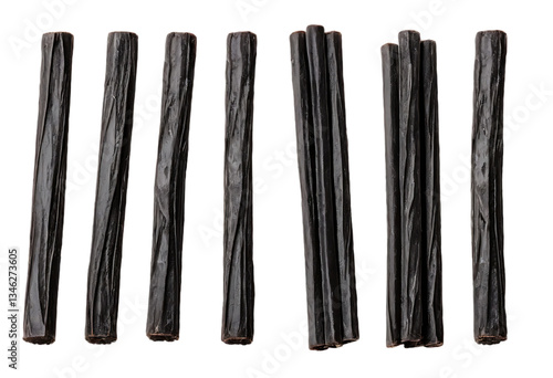 Sweet black licorice sticks isolated on white background – ideal for candy and food photography