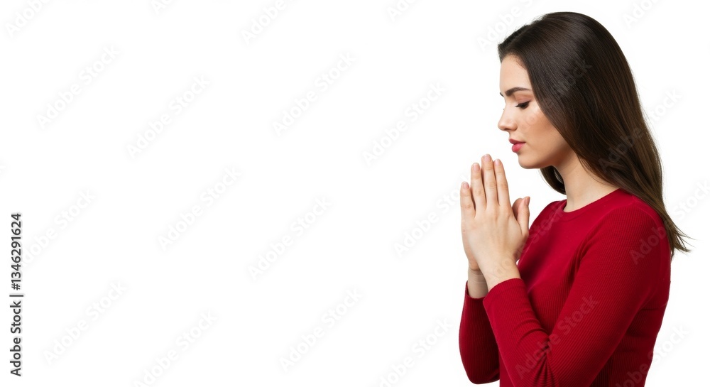 Woman praying, hands clasped.