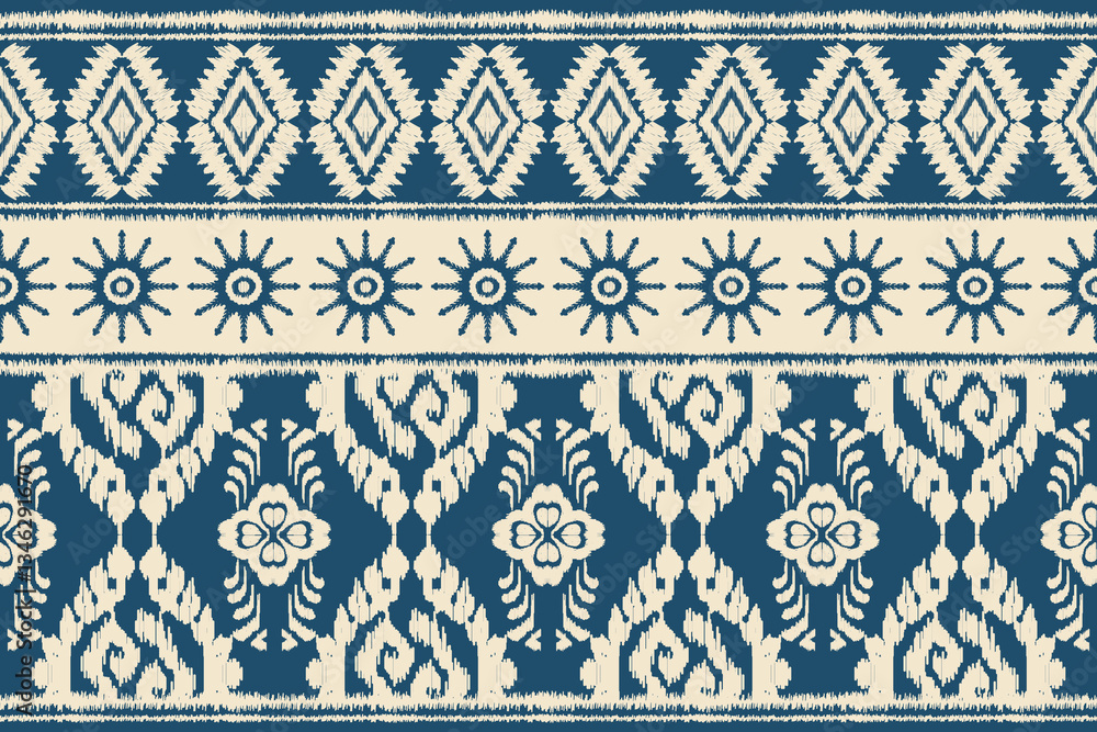 Fototapeta premium Motifs African boho paisley Floral Ikat pattern embroidery border. Ethnic ikat floral Indian Pattern.Aztec ornament print. Geometric ethnic pattern seamless color oriental.