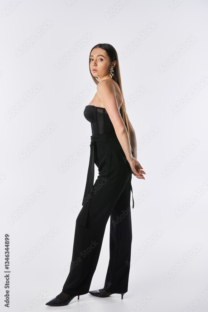 Young pretty woman showcases stunning fashion in a modern studio setting with minimalist vibe Young pretty woman showcases stunning fashion in a modern studio setting with minimalist vibe