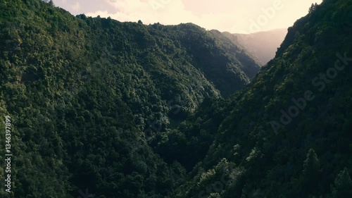 Spectacular aerial view flying over beautiful mountains at sunset on the island of La Palma in the Canary Islands