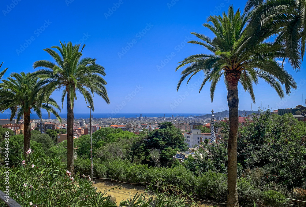 Fototapeta premium Barcelona panoramic view from Parc Guell viewpoint, Barcelona city, parc guell and the mediterranean sea are saw from there in a sunny day.