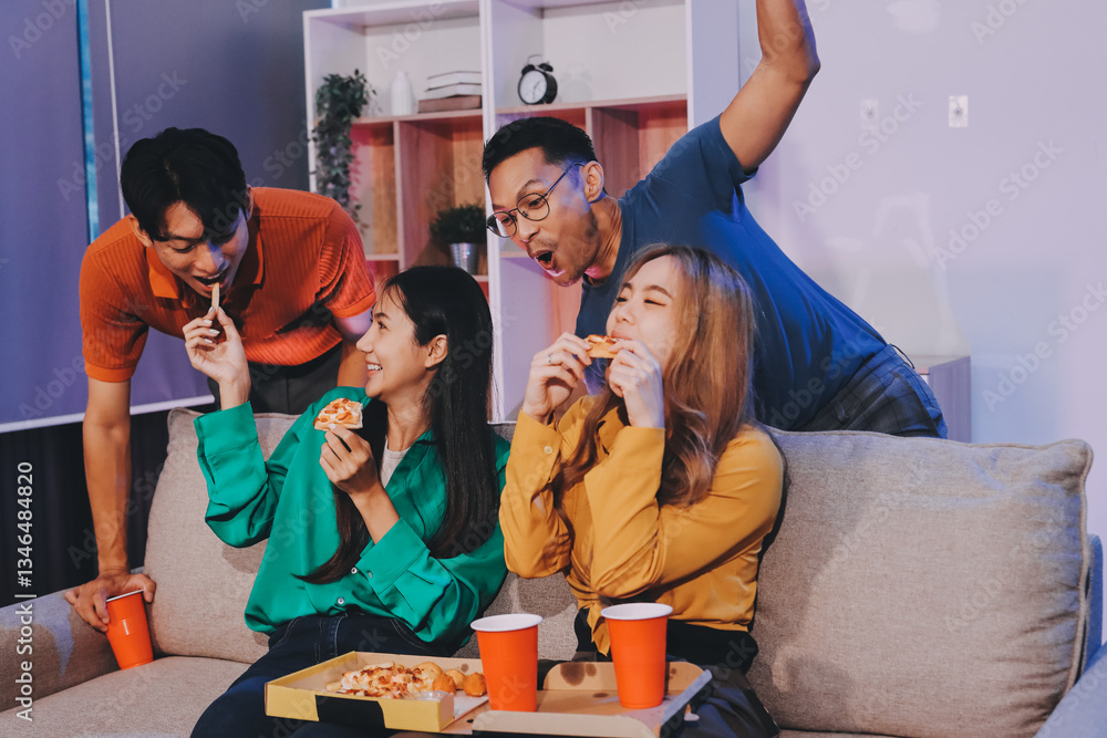 Obraz premium Happy young friends group having lunch at home. Asia family party eating pizza food and laughing enjoying meal while sitting at dining table together at house. Celebration holiday and togetherness.