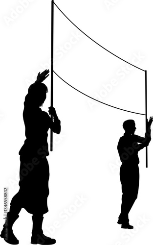 Two protestors or demonstrators at a demonstration march, picket line or strike protest rally in silhouette. Holding up a banner sign.