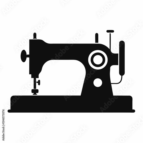 Vintage black sewing machine isolated on a white background