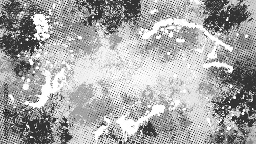 Grunge background with white and black smudges and halftone dots.