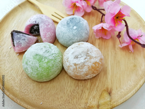 Daifuku Mochi Japanese desert on wooden plate.