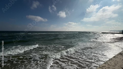 Flock of seagulls flying over choppy sea water, creating a dynamic and wild atmosphere