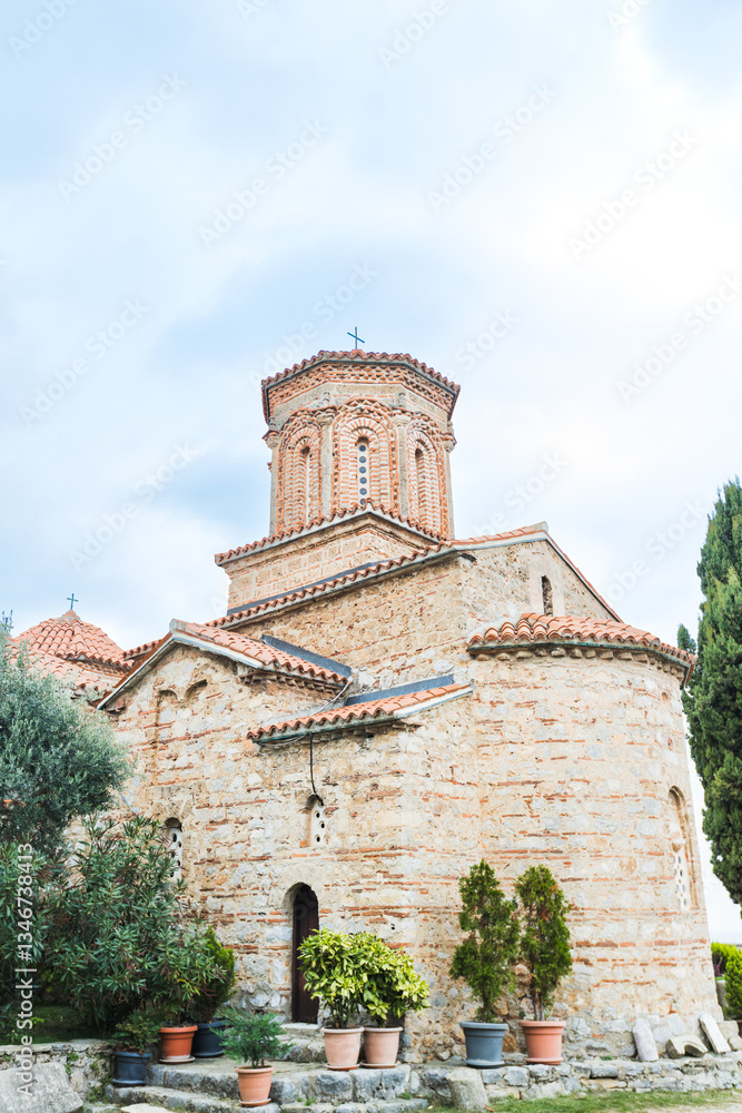 Historic Monastery of Saint Naum with Red-Tiled Roofs and Cylindrical Towers, Ohrid, North Macedonia Historic Monastery of Saint Naum with Red-Tiled Roofs and Cylindrical Towers, Ohrid, North Macedonia