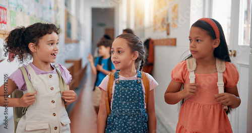 Fotografi Children, friends and talking in corridor at school for education, learning or recess