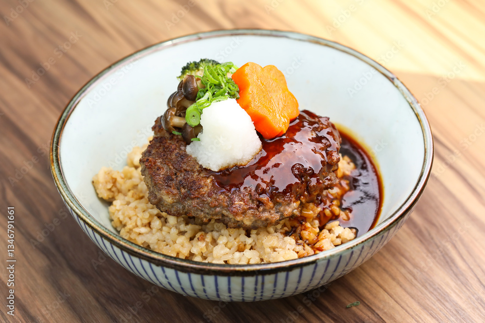 Japanese Hamburg Steak Rice bowl with gravy and vegetables served in bowl isolated on table closeup side view of Japanese food Japanese Hamburg Steak Rice bowl with gravy and vegetables served in bowl isolated on table closeup side view of Japanese food