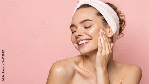 Radiant Skincare Routine: Woman Applying Moisturizer on Her Face Against a Soft Pink Background