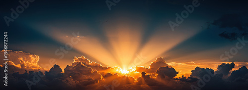 dramatic sunset with sun rays cutting through turbulent storm clouds, creating stunning contrast