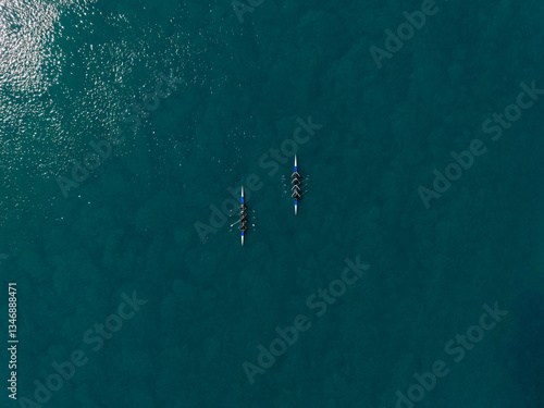 Tableau sur toile Aerial photo of two teams racing against each other.