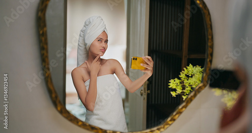 Photography Indian happy gen z young adult female lady wrapped towel head and body after sho